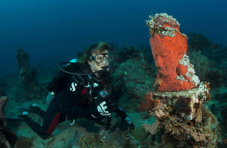 Cherie Deacon exploring Bali's Undersea Temple Garden